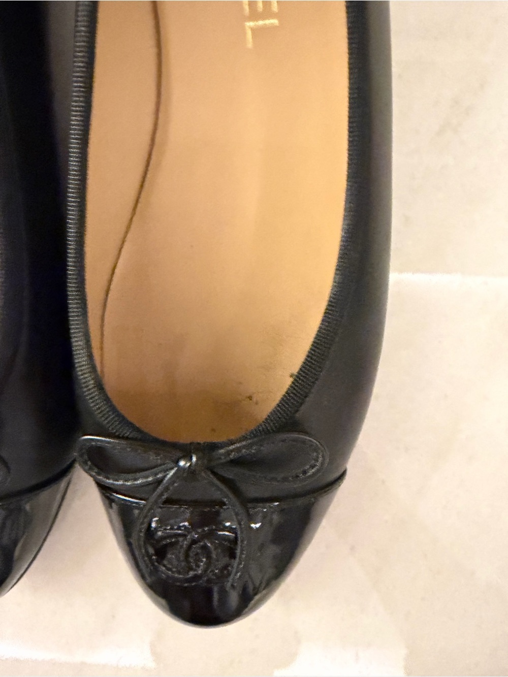 CHANEL Black Leather Ballet Flats with Patent Cap Toe and Bow - Picture 4 of 11